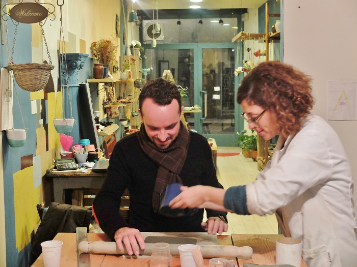 Nico and Anita making mugs in her shop on via romana