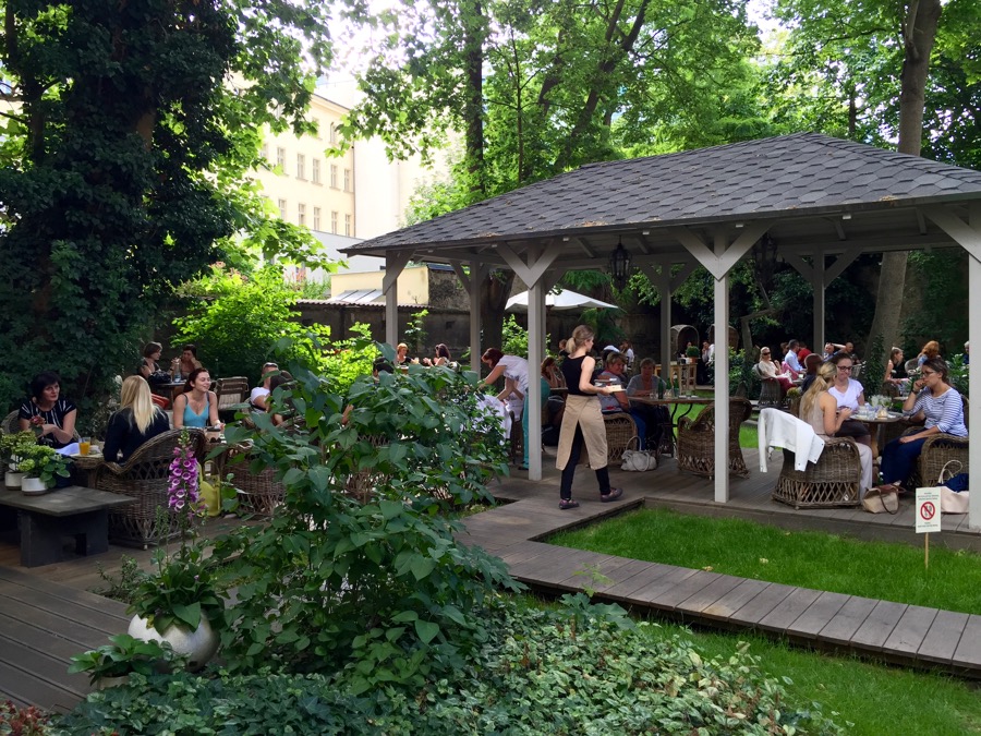 Inner courtyard of cute home interior shop turned cafe Styl & Interior. Known for their black current wine. 